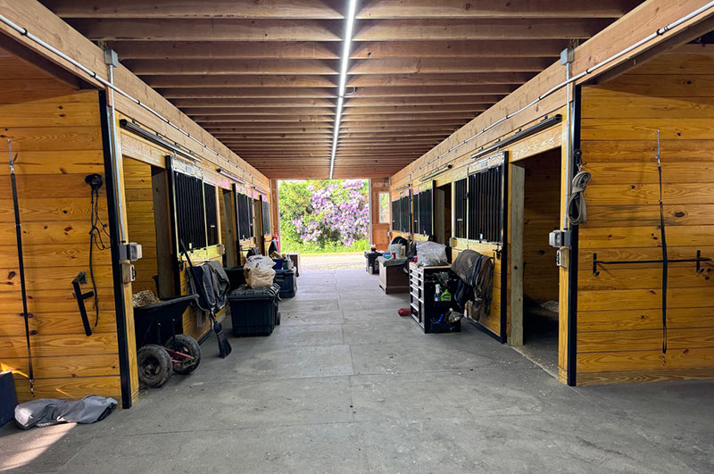 Center Aisle with 15 Stalls, Tack/Feed and Wash Room, 4 Open Areas